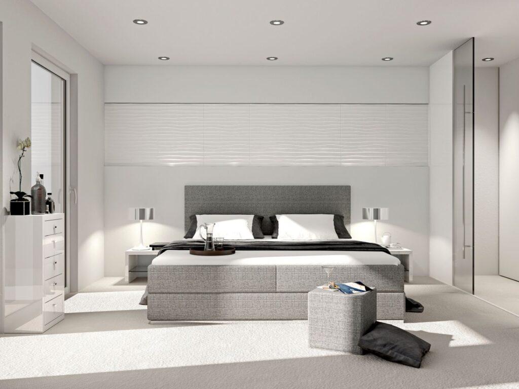Helles modernes Schlafzimmer mit grauem Boxspringbett und Designbeleuchtung – Beispiel zum Boxspringbett kaufen